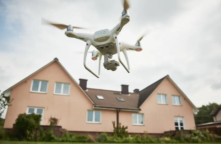 How Do Police Drones Navigate Obstacles Like Walls and Windows When Attempting to See Inside Houses?